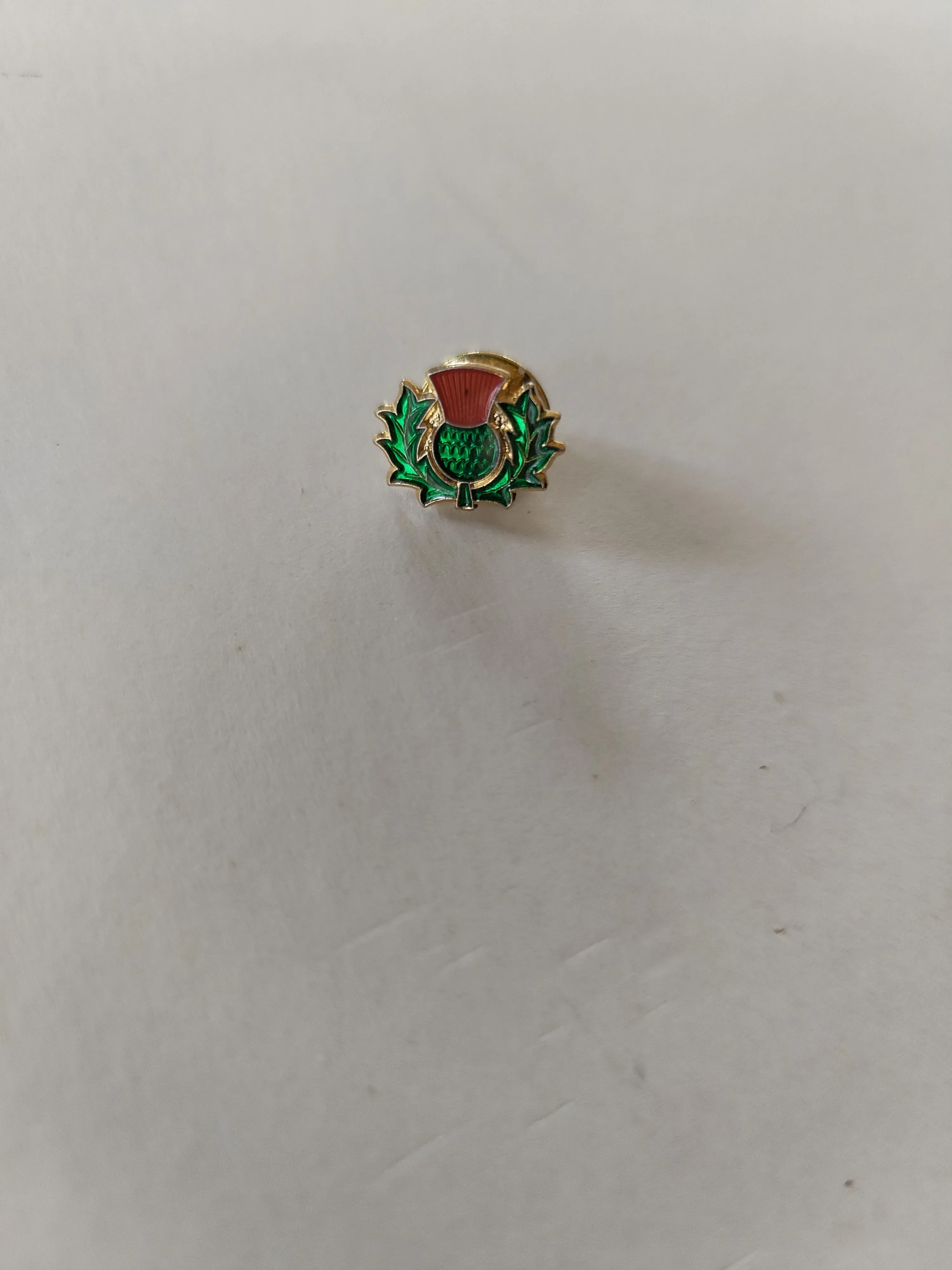 Painted thistle lapel pin